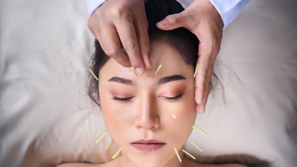 needles all over the woman's face